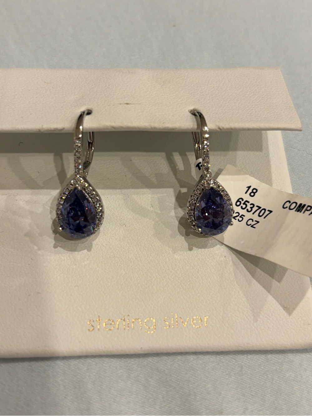 CO Sterling Silver Teardrop Purple CZ Dangle Earrings